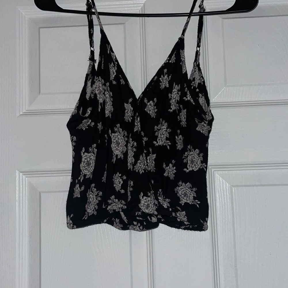 Black top with floral print